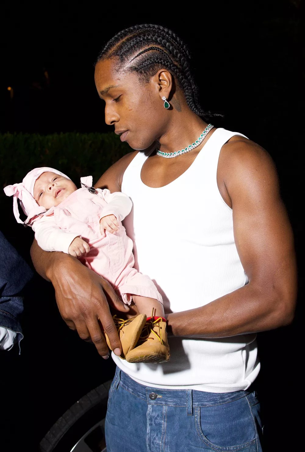 Asap Rocky carrying baby Riot