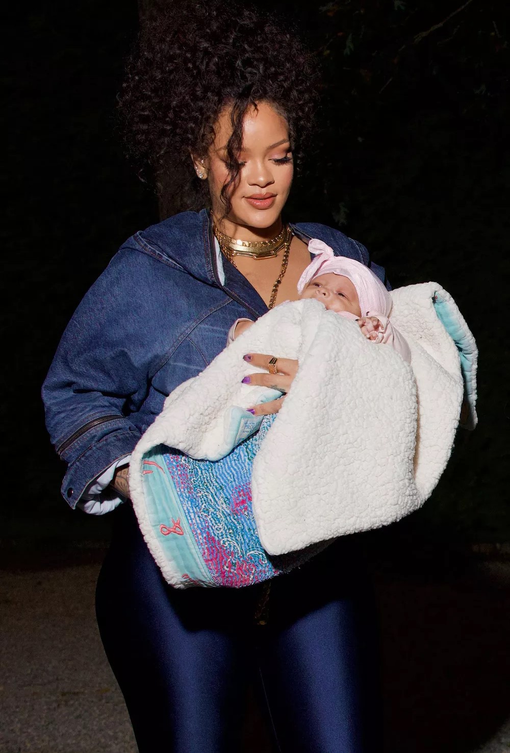 Rihanna carrying baby Riot