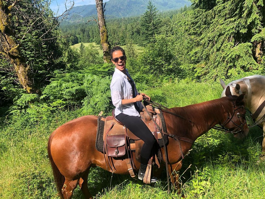 Gugu Mbatha Raw riding a horse