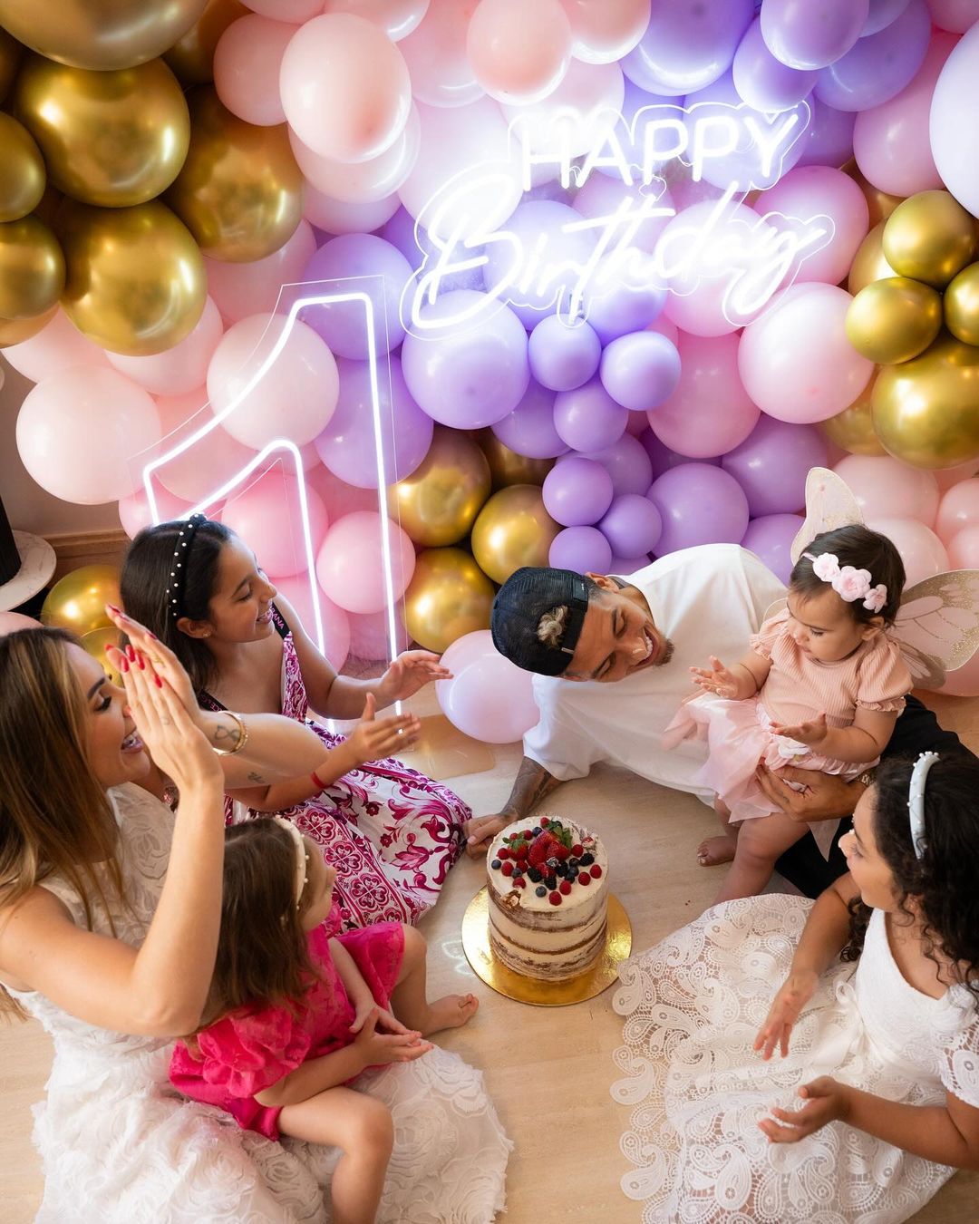 Roberto Firmino, his wife and children