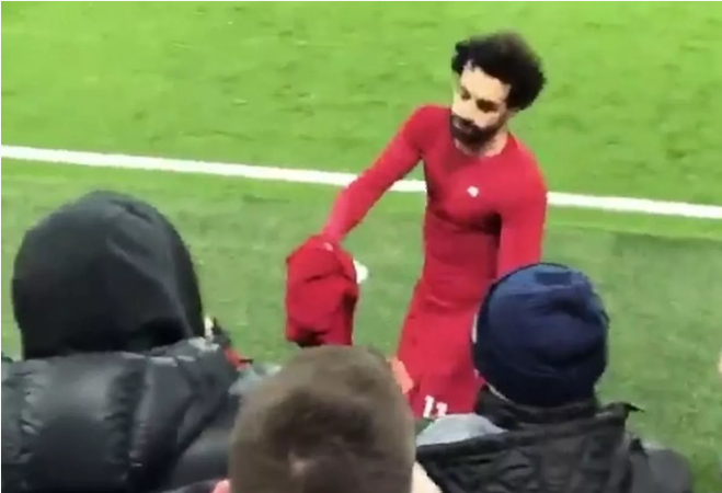  Mohamed Salah handed his shirt to a young Liverpool fan