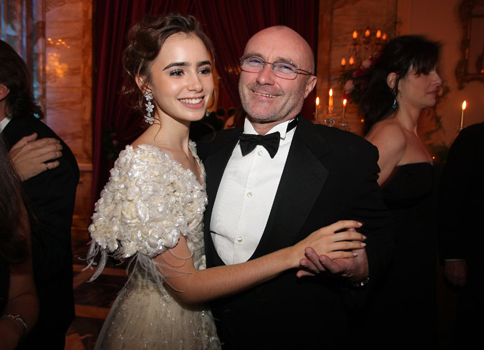 Lily Collins with her father Phil Collins