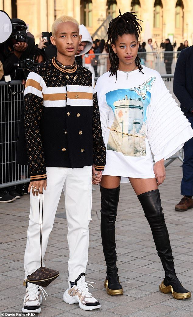 Jaden Smith holds hands with sister Willow Smith  at Louis Vuitton PFW show