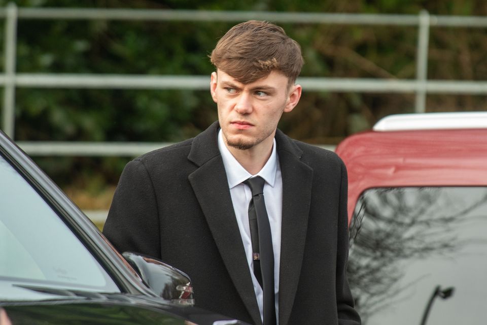 Bradly at the burial of his father