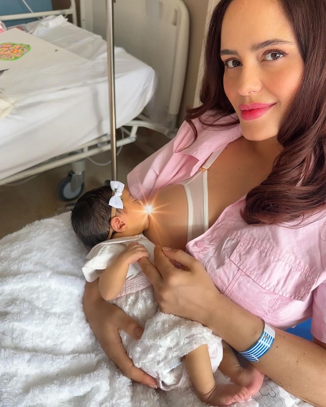 Ana Lucía Rodriguez breastfeeding her new born baby Luciana