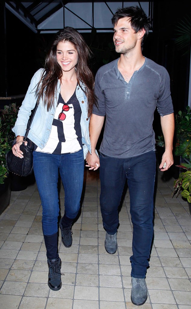 Marie Avgeropoulos with Taylor Lautner in 2014