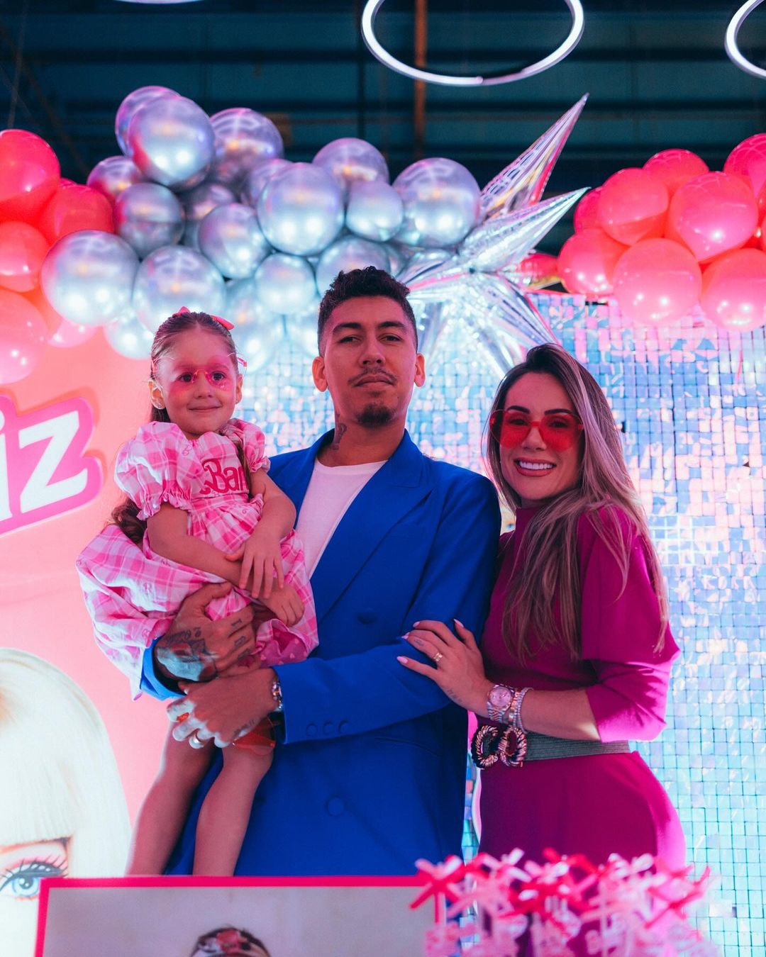 Roberto Firmino, his wife and their daughter Liz on her birthday