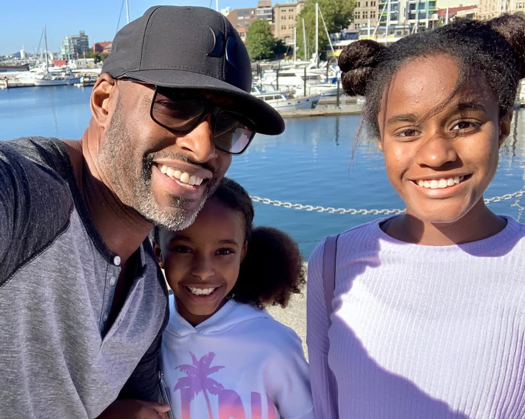 Colin Lawrence with his daughters