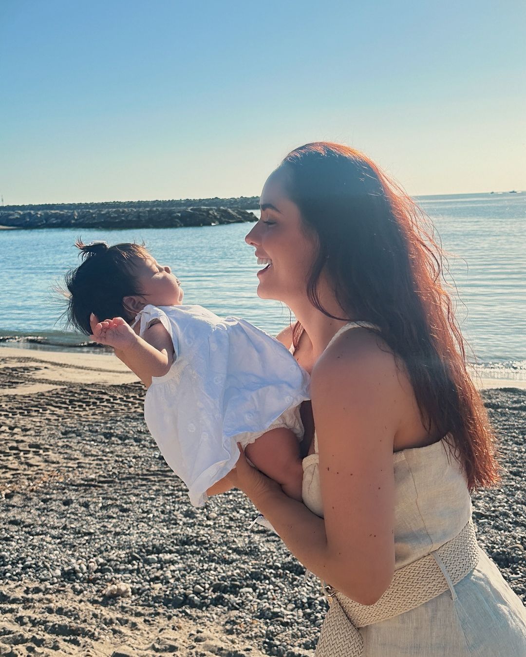 Ana Luciia Dominguez, her  3 months old daughter at the beach