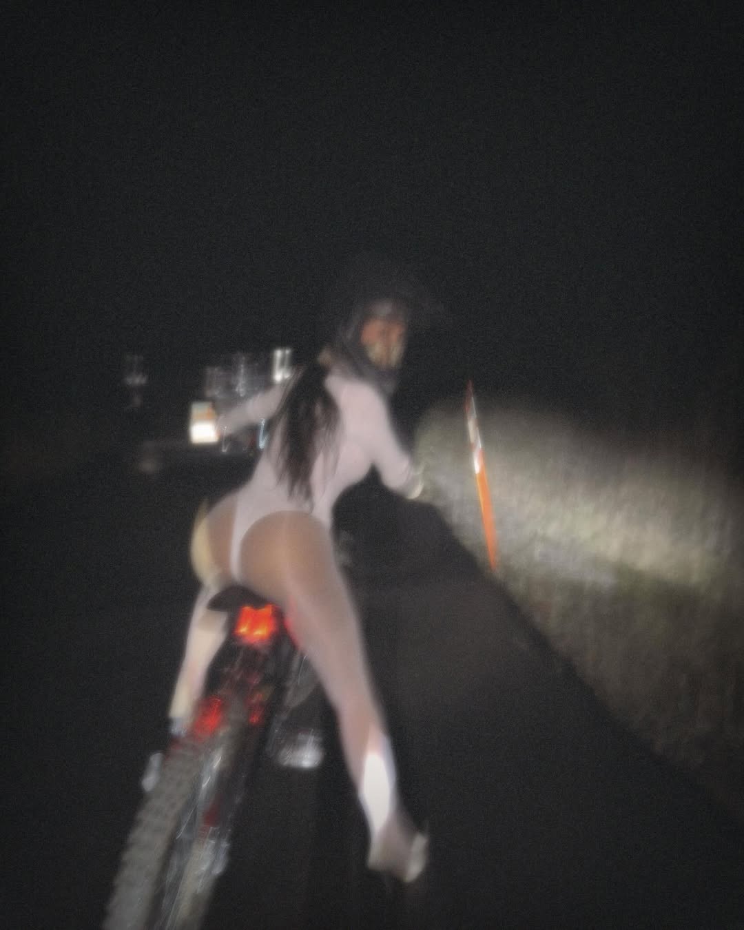 Kim Kardashian riding a bike 