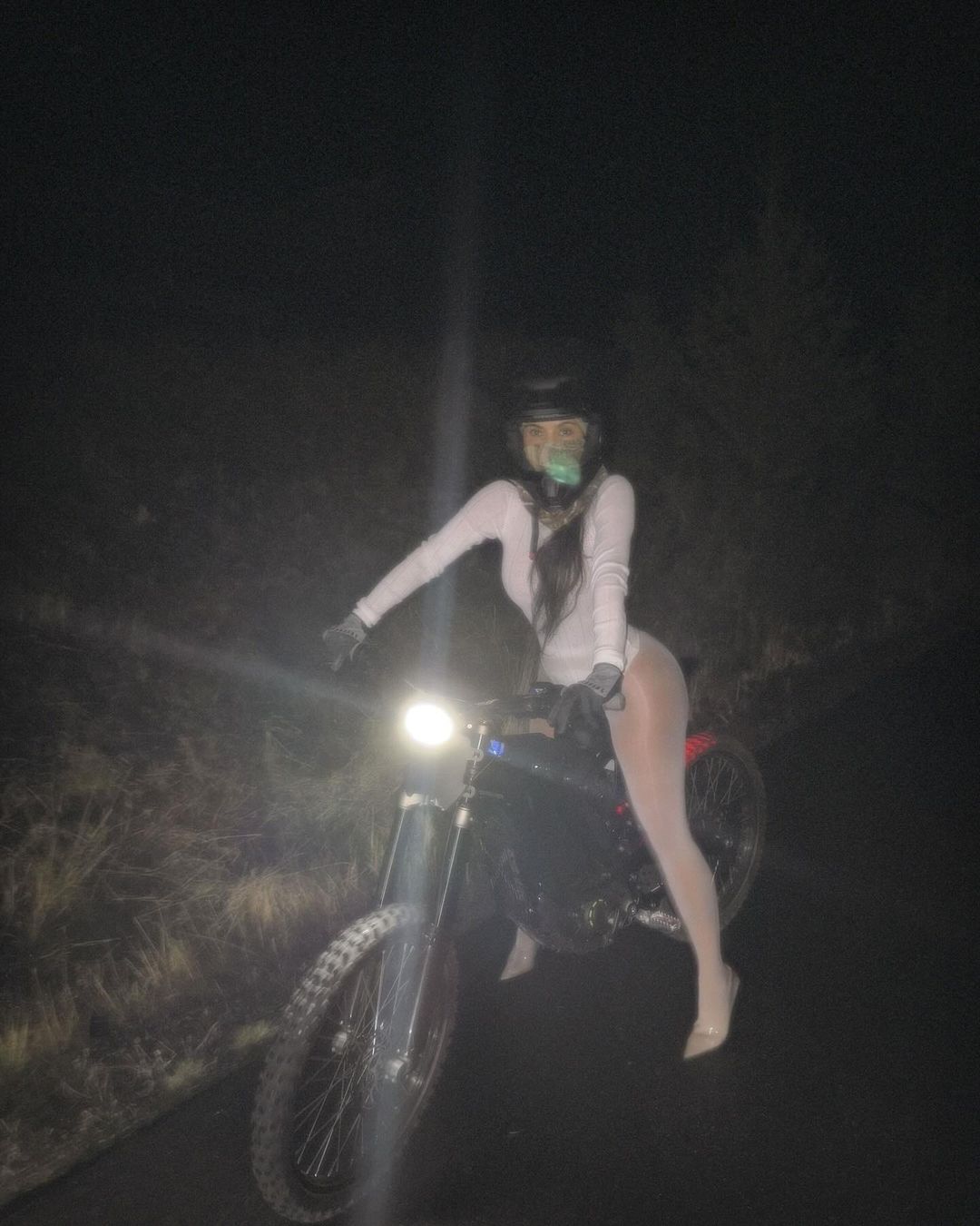 Kim Kardashian riding a bike 