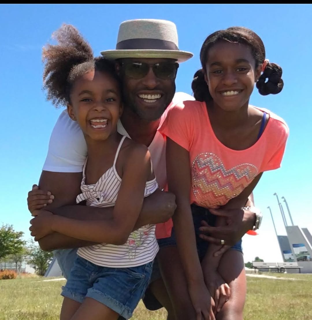 Colin Lawrence with his then young daughters